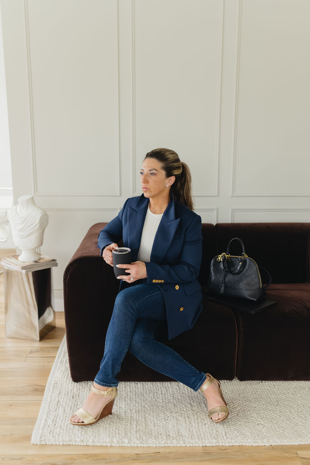 Morgan Arbez seated with a coffee